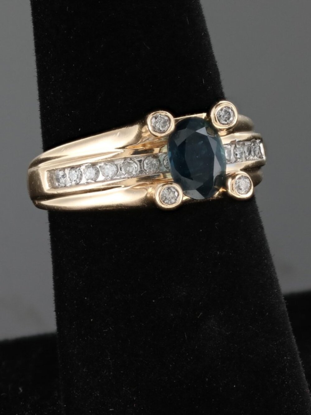 14K yellow gold ring oval-cut blue sapphire channel set diamonds,4 bexel corners